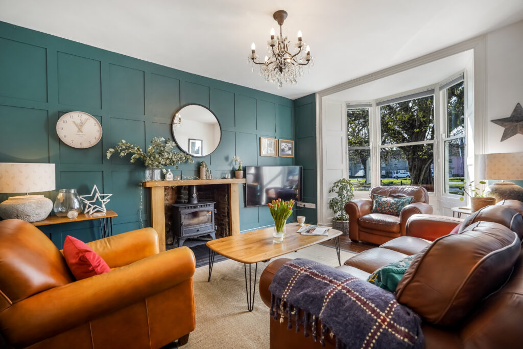 living room with leather sofas